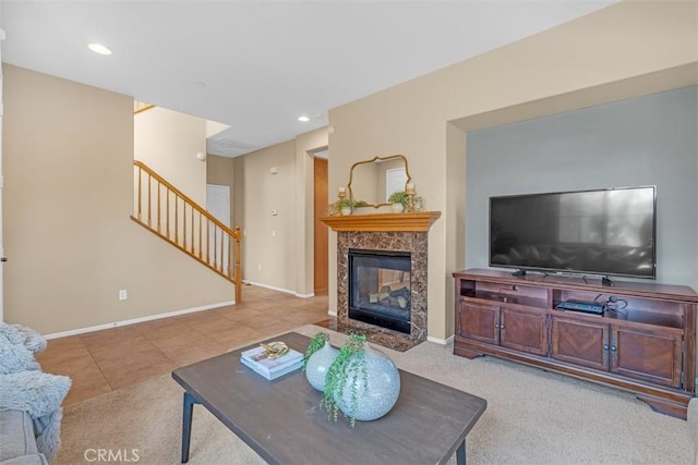 living room featuring tile patterned floors and a fireplace