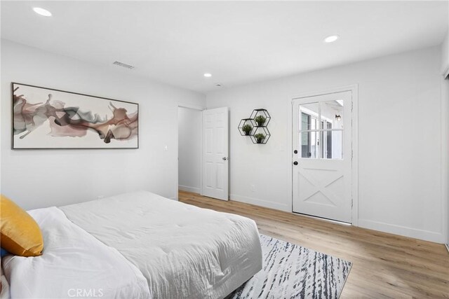 bedroom with light wood-type flooring