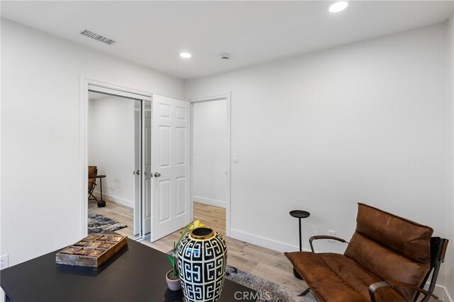 living area with light wood-type flooring