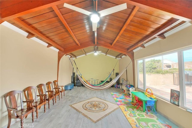 game room with vaulted ceiling with beams, wood ceiling, and light hardwood / wood-style flooring