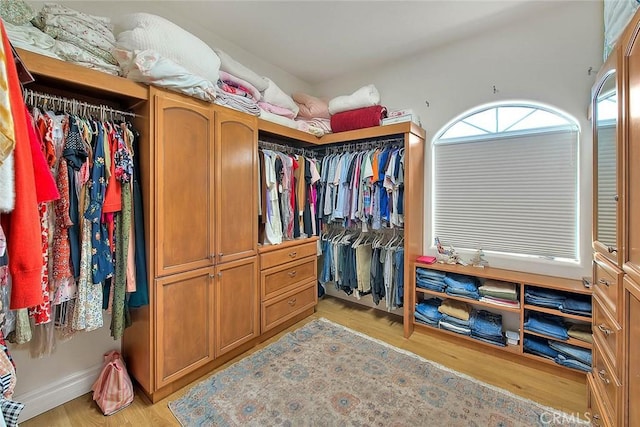 walk in closet featuring light wood-type flooring