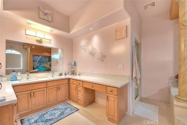 bathroom with vanity, tile patterned floors, and walk in shower