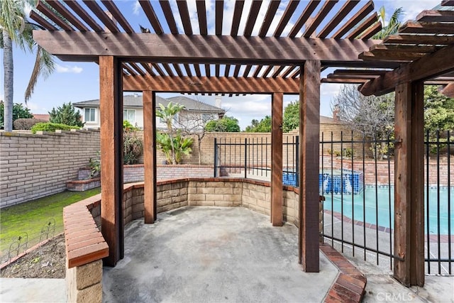 view of patio with a fenced in pool and a pergola