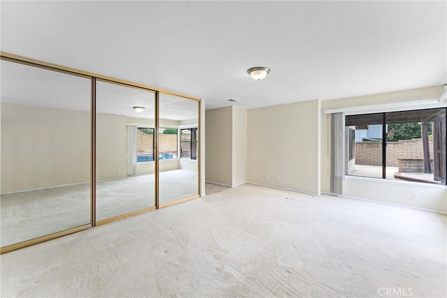 unfurnished bedroom featuring carpet floors