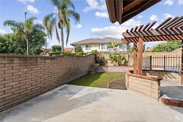 view of patio featuring a pergola