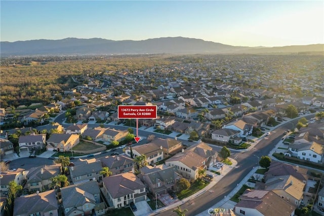 bird's eye view featuring a residential view and a mountain view