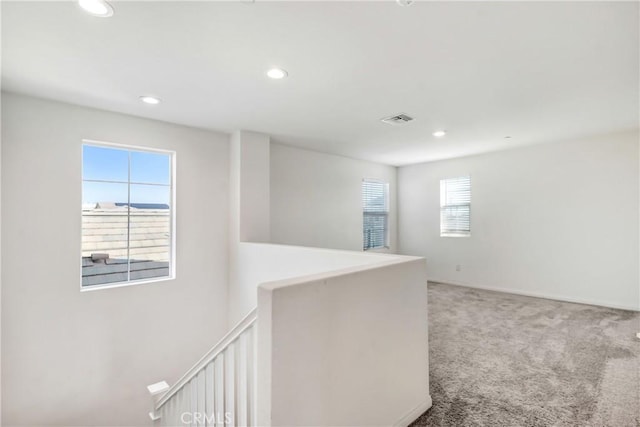 empty room featuring carpet floors