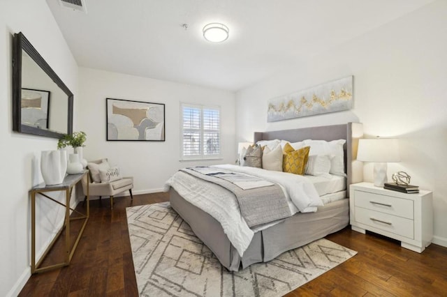 bedroom featuring dark hardwood / wood-style floors