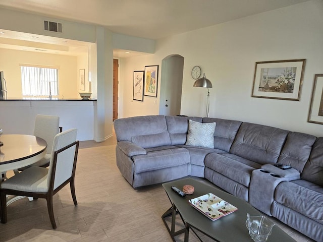 living room with light hardwood / wood-style flooring