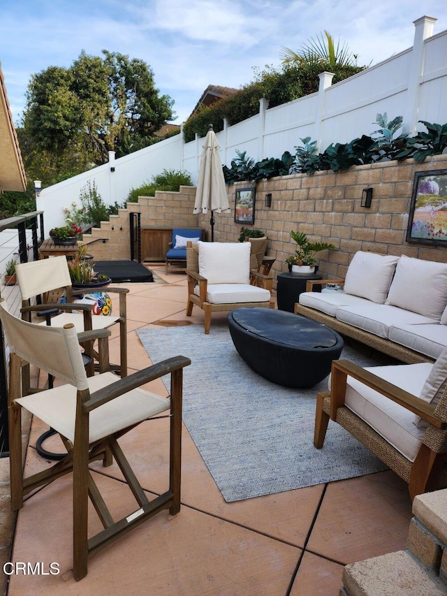 view of patio featuring an outdoor hangout area