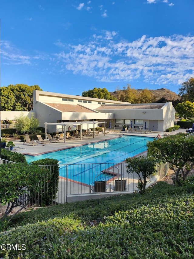 view of swimming pool featuring a patio