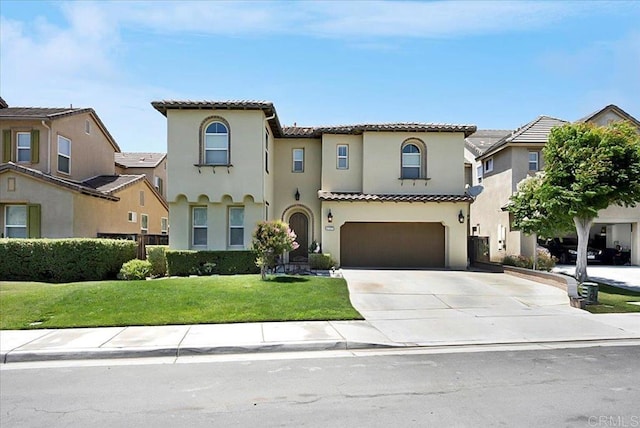 mediterranean / spanish house featuring a garage, a tile roof, driveway, a residential view, and stucco siding