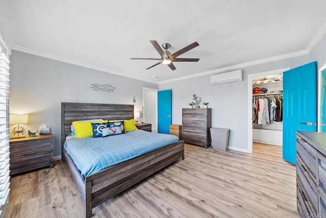 bedroom featuring crown molding, a wall mounted air conditioner, a closet, ceiling fan, and light hardwood / wood-style floors