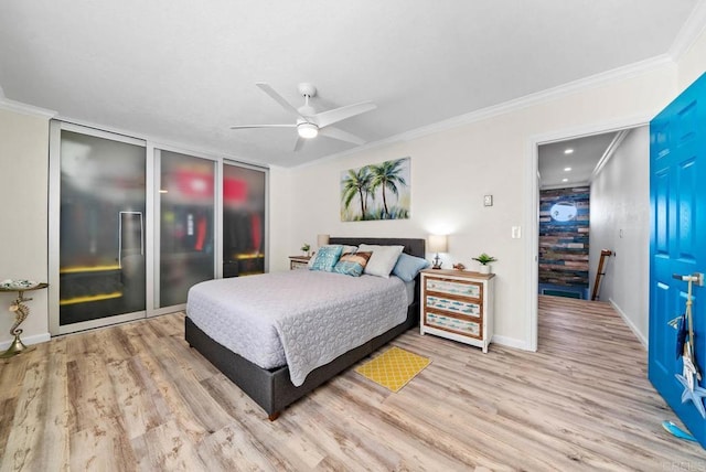 bedroom with crown molding, ceiling fan, and light hardwood / wood-style floors