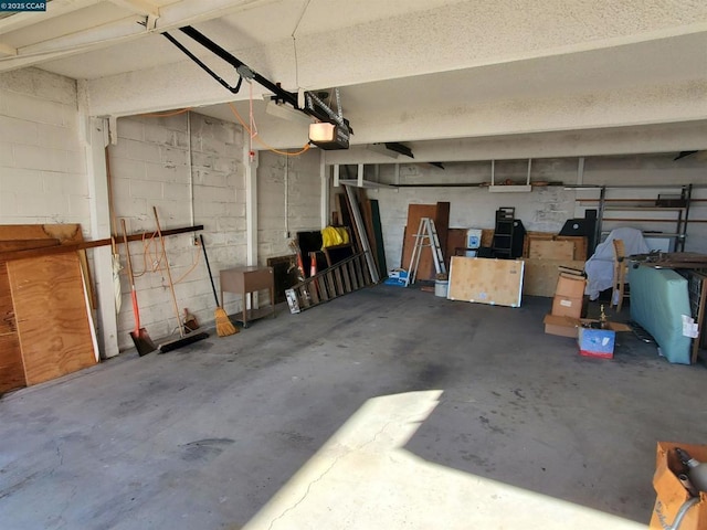 garage featuring a garage door opener