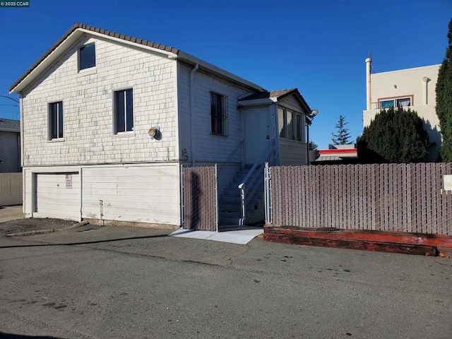 view of home's exterior featuring a garage