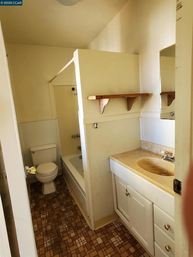 full bathroom featuring vanity, shower / washtub combination, and toilet