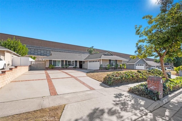 single story home featuring a garage