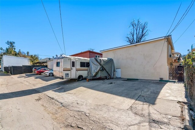 4665 Huntington Dr N, Los Angeles, CA 90032 - back of house with fence and stucco siding