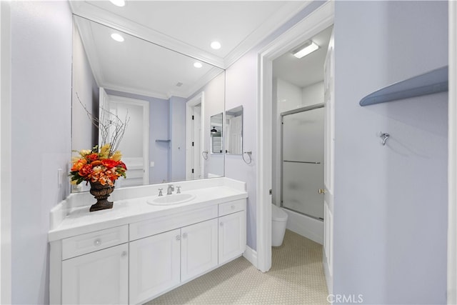 full bathroom with crown molding, combined bath / shower with glass door, tile patterned flooring, vanity, and toilet