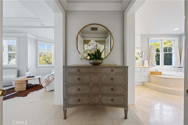 interior space featuring ornamental molding