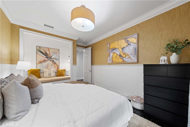 bedroom with crown molding