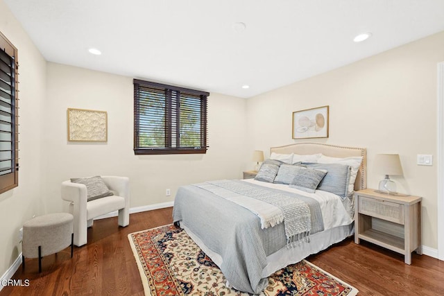 bedroom featuring dark wood-type flooring