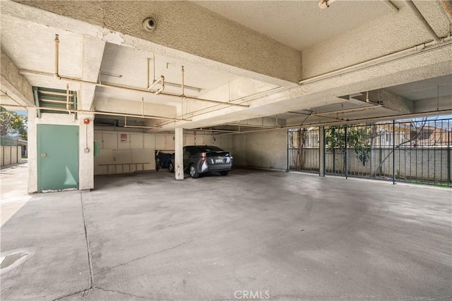 garage featuring a carport