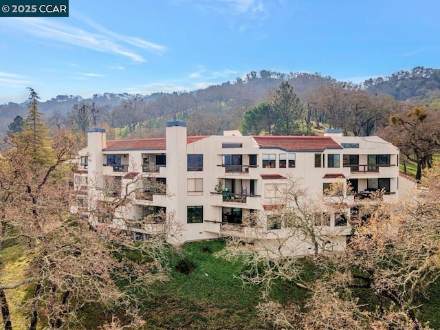 view of property featuring a mountain view