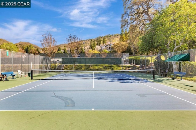 view of sport court featuring a mountain view