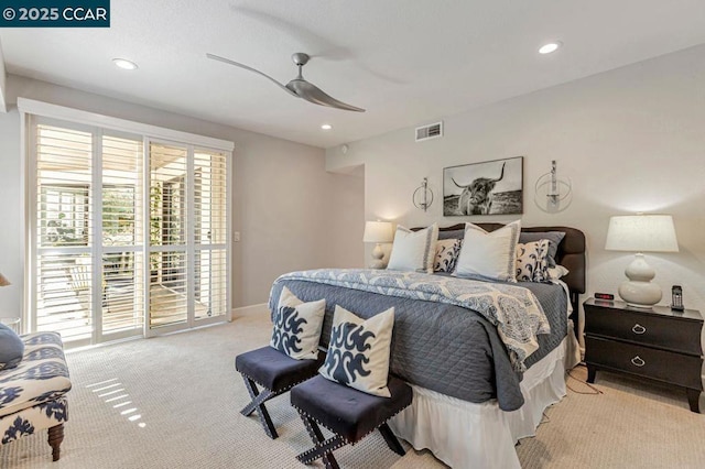 bedroom with light carpet, access to exterior, and ceiling fan