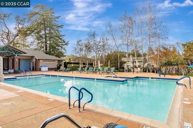 view of pool featuring a patio area