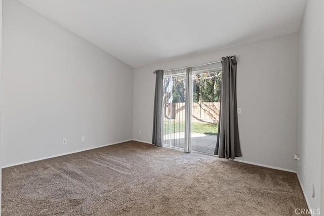 empty room with carpet flooring