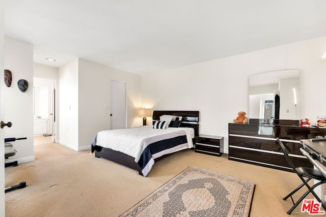 bedroom with light colored carpet