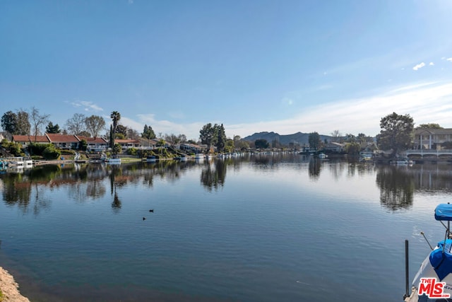 property view of water featuring a mountain view