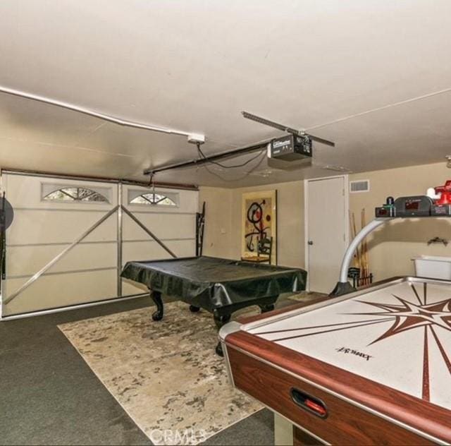 game room with concrete flooring and pool table