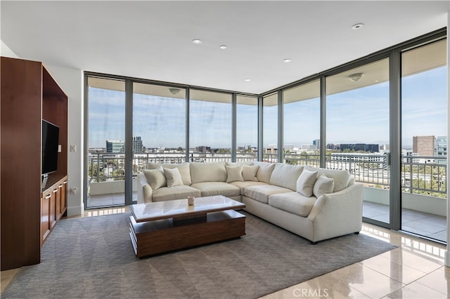 living room featuring expansive windows and a view of city