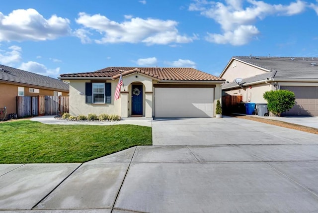 mediterranean / spanish home featuring a garage and a front lawn