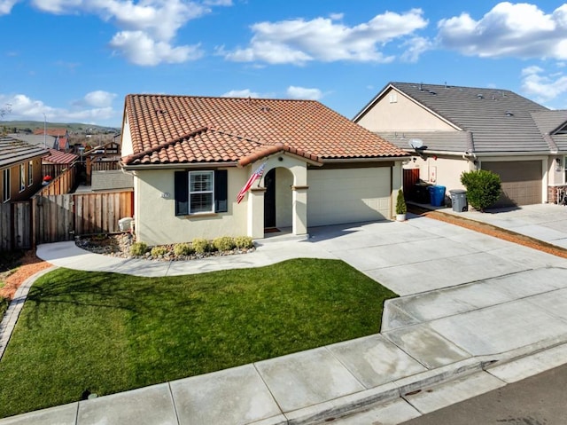 view of front facade featuring a garage and a front lawn