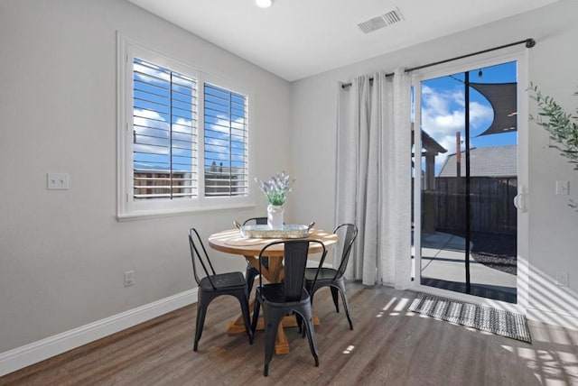 dining room featuring wood-type flooring