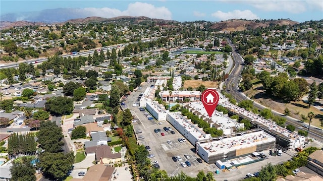 drone / aerial view featuring a mountain view