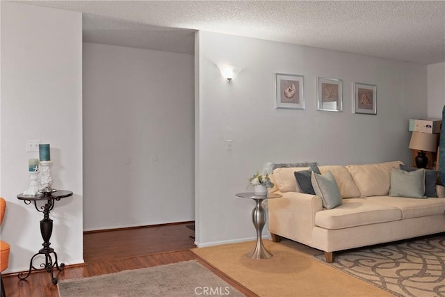 23617 Golden Springs Dr Unit K19, Diamond Bar, CA 91765 - living area featuring wood finished floors, a textured ceiling, and baseboards