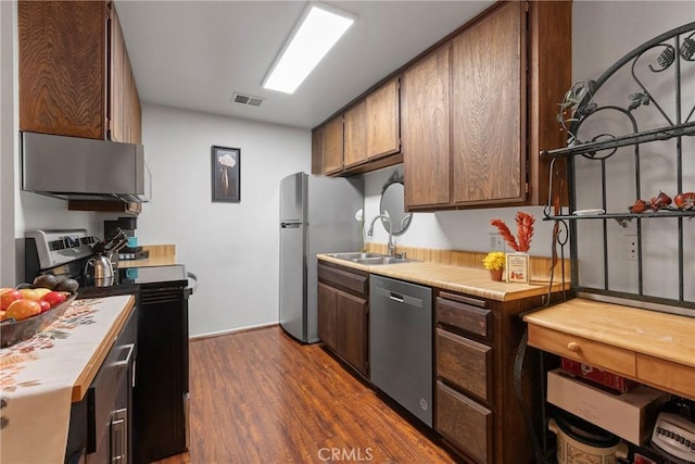 23617 Golden Springs Dr Unit K19, Diamond Bar, CA 91765 - kitchen with appliances with stainless steel finishes, a sink, light countertops, and dark wood finished floors