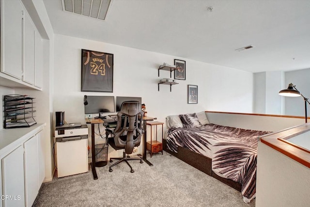 bedroom featuring light colored carpet