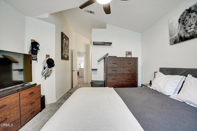 carpeted bedroom with ceiling fan and lofted ceiling