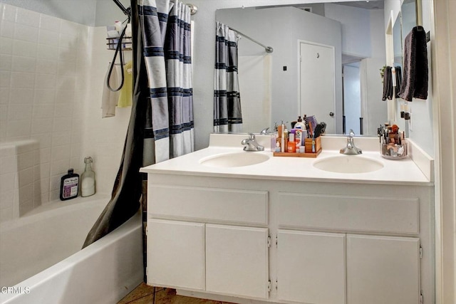 bathroom featuring vanity, tile patterned flooring, and shower / tub combo