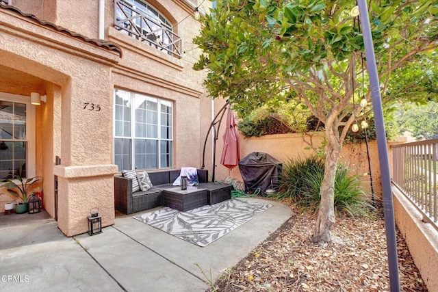 view of patio featuring area for grilling and outdoor lounge area