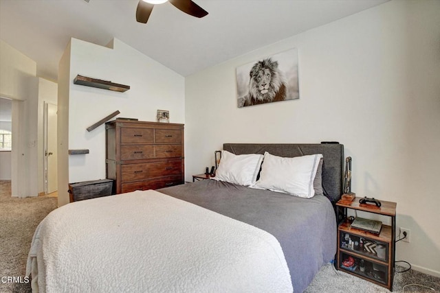 carpeted bedroom with lofted ceiling and ceiling fan