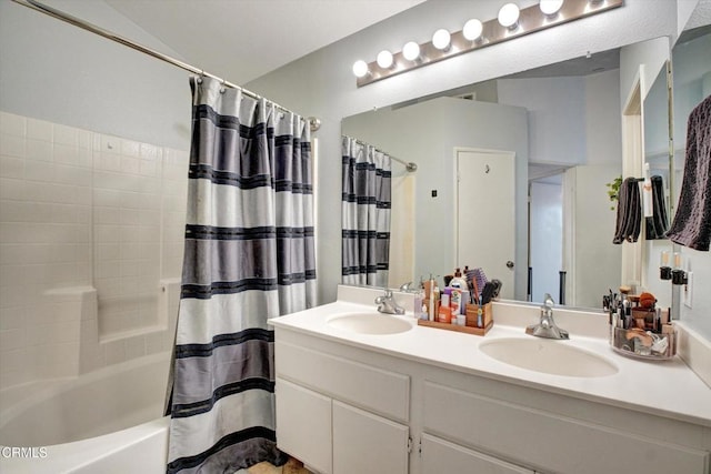 bathroom with vanity and shower / tub combo