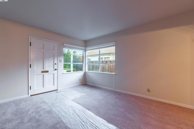 view of carpeted spare room